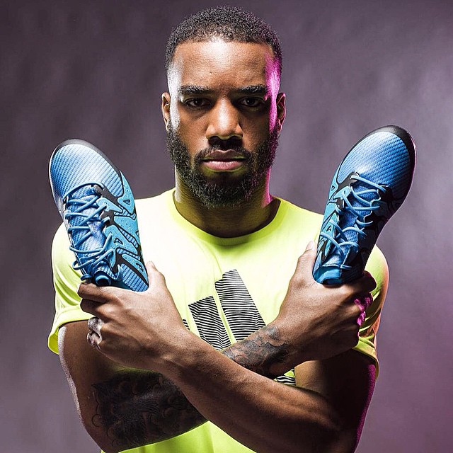 Blue adidas top soccer boots
